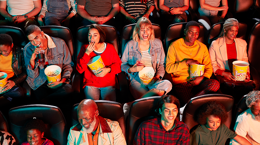 Birds eye view of multi-ethnic audience in cinema